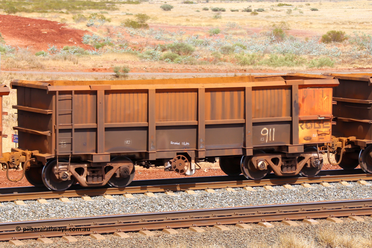 0911 141124 6785
Robe River ore waggon 911, built by Nippon Sharyo Nihon, Japan, fixed coupler handbrake side empty view, note modified underfloor arrangement, at the 25 km at Arches Siding on the Cape Lambert line. November 24, 2014.
Keywords: 911;Nippon-Sharyo-Nihon-Japan;Robe-ore-waggon;