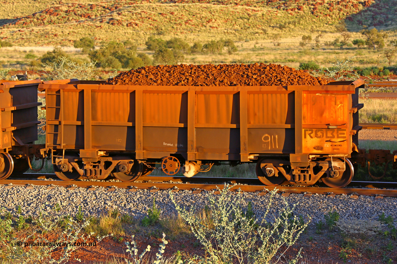 0911 170513 8679
Robe River ore waggon 911, built by Nippon Sharyo Nihon, rotary coupler end handbrake side loaded view, note modified underfloor arrangement, Cape Lambert yard, May 13, 2017.
Keywords: 911;Nippon-Sharyo-Nihon-Japan;Robe-ore-waggon;