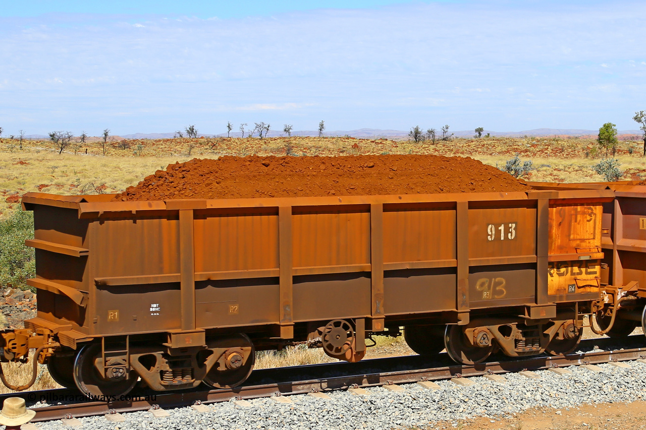 0913 170729 0255
Robe River ore waggon 913, built by Centurion Industries WA, fixed coupler handbrake side loaded view at the 103 km, between Maitland Siding and the Fortescue River on the Deepdale line. July 29, 2017.
Keywords: 913;Centurion-Industries-WA;Robe-ore-waggon;