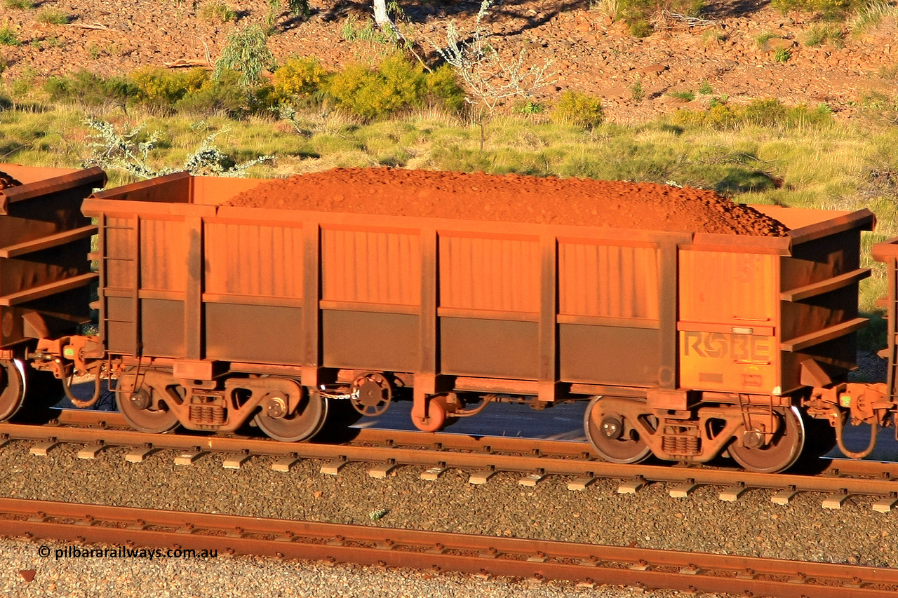 0915 110602 1711
Robe River ore waggon 915, built by Centurion Industries WA, rotary coupler end handbrake side loaded view at the 71 km, Western Creek on the Deepdale line. June 2, 2011.
Keywords: 915;Centurion-Industries-WA;Robe-ore-waggon;