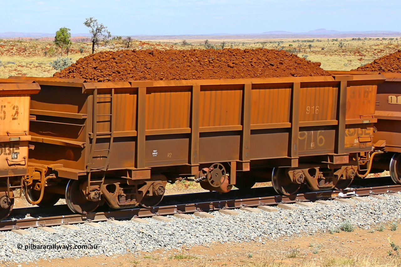 0916 170729 0203
Robe River ore waggon 916, built by Centurion Industries WA, fixed coupler handbrake side loaded view at the 103 km, between Maitland Siding and the Fortescue River on the Deepdale line. July 29, 2017.
Keywords: 916;Centurion-Industries-WA;Robe-ore-waggon;