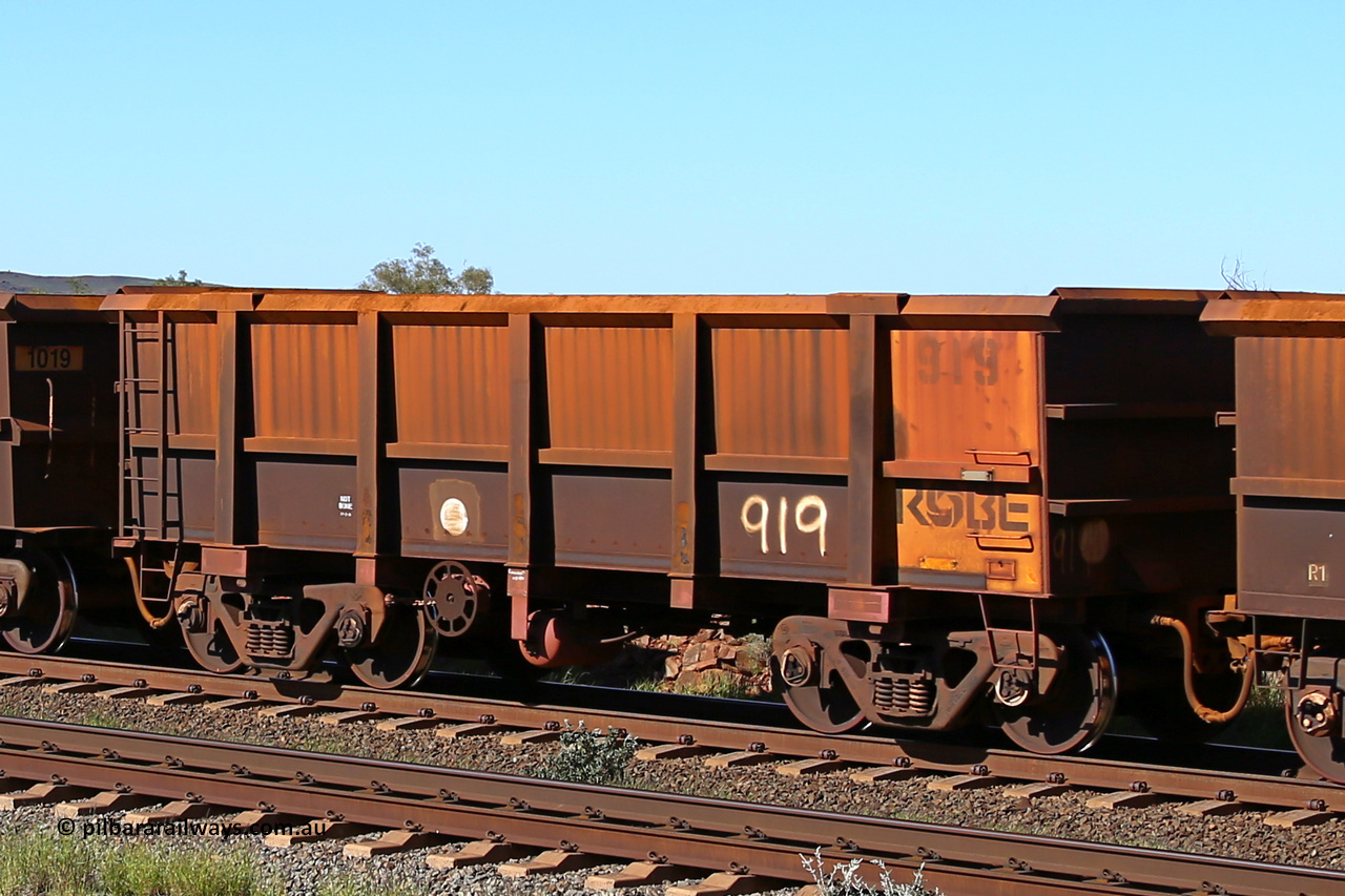 0919 160727 0950
Robe River ore waggon 919, built by Centurion Industries WA, rotary coupler end handbrake side empty view at Harding Siding on the Cape Lambert line, July 27, 2016.
Keywords: 919;Centurion-Industries-WA;Robe-ore-waggon;