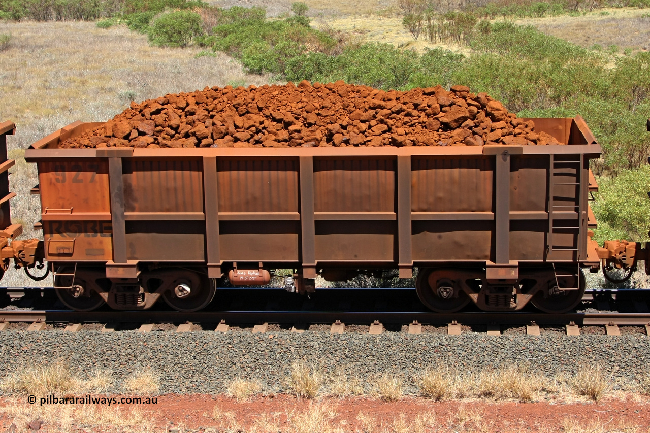 0927 081209 0130
Robe River ore waggon 927, built by Centurion Industries WA, non-handbrake side loaded view at the 7 km location just south of Cape Lambert yard. December 9, 2008.
Keywords: 927;Centurion-Industries-WA;Robe-ore-waggon;