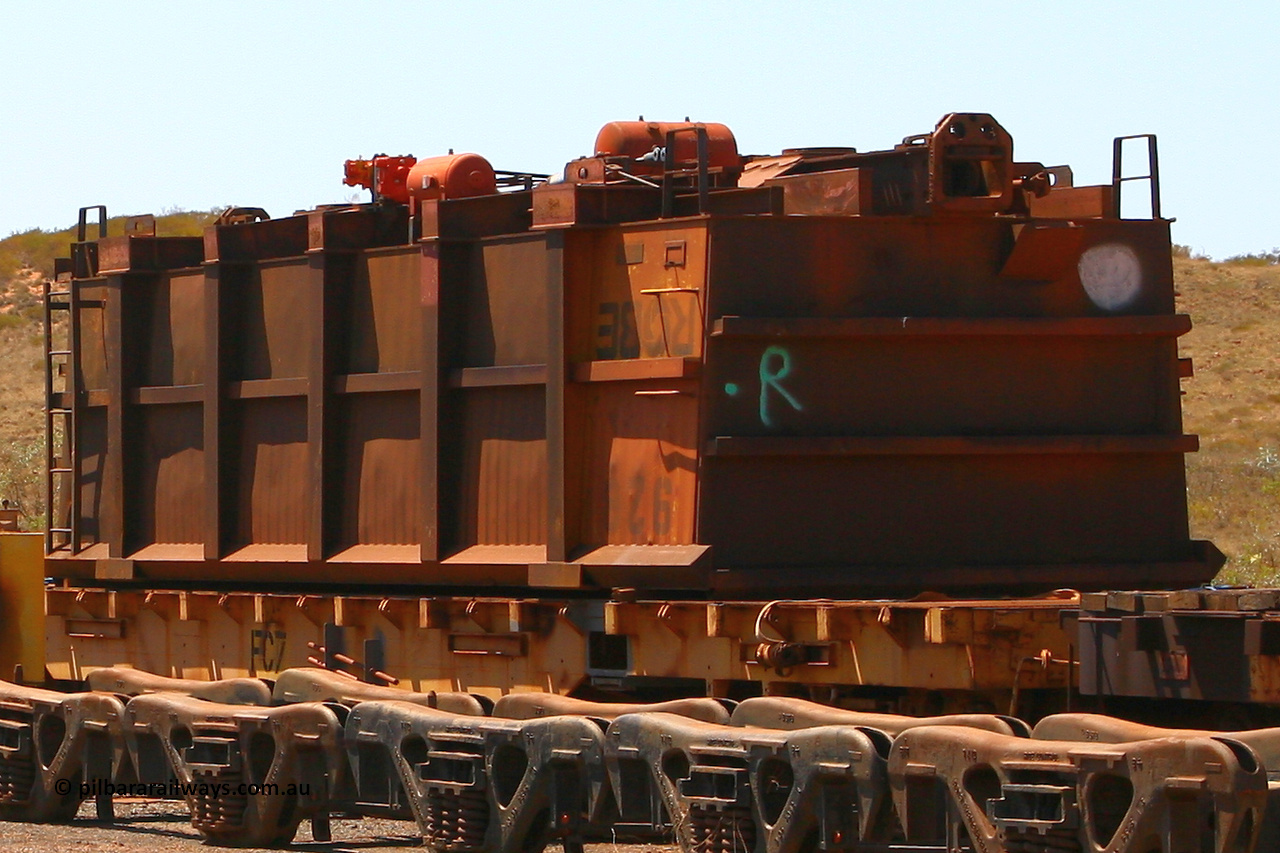 0928 070909 0667
Robe River ore waggon 928, built by Centurion Industries WA, rotary coupler end non-handbrake side upside down on flat waggon FC7, Cape Lambert. September 9, 2007.
Keywords: 928;Centurion-Industries-WA;Robe-ore-waggon;