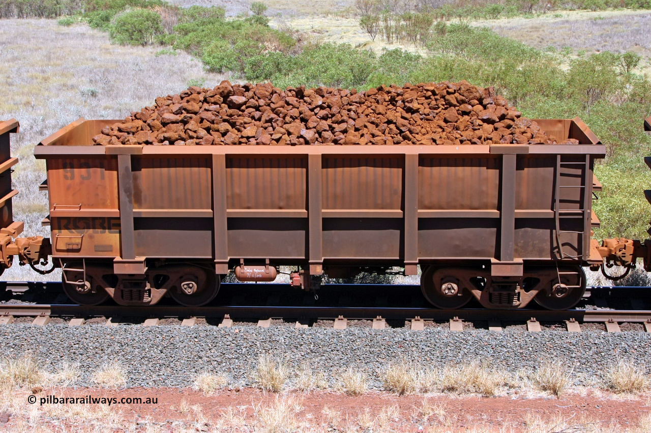 0931 081209 0119
Robe River ore waggon 931, built by Centurion Industries WA, non-handbrake side loaded view at the 7 km location just south of Cape Lambert yard. December 9, 2008.
Keywords: 931;Centurion-Industries-WA;Robe-ore-waggon;