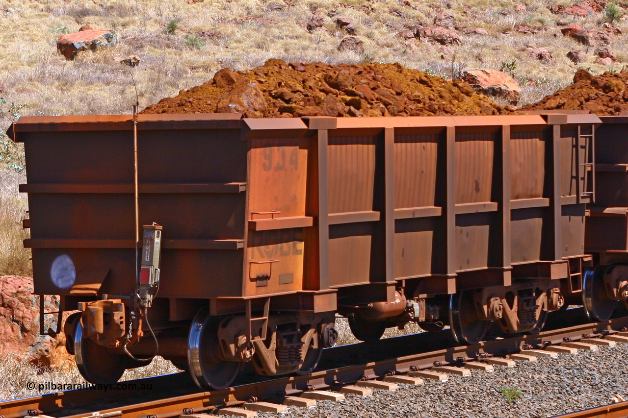 0934 061209 8194
Robe River ore waggon 934, built by Centurion Industries WA, rotary coupler end non-handbrake side loaded end of train view at it enters Cape Lambert yard, December 9, 2006.
Keywords: 934;Centurion-Industries-WA;Robe-ore-waggon;