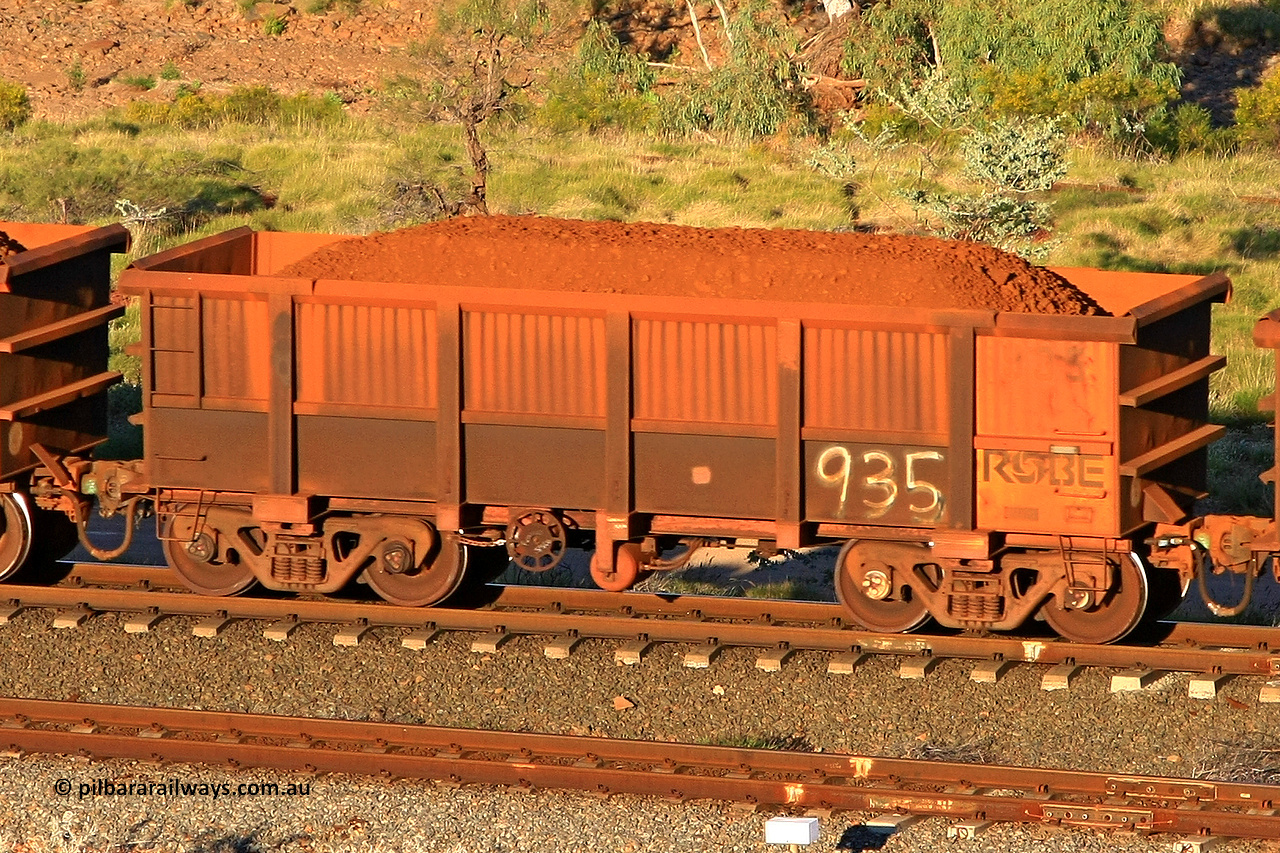0935 110602 1618
Robe River ore waggon 935, built by Centurion Industries WA, rotary coupler end handbrake side loaded view at the 71 km, Western Creek on the Deepdale line. June 2, 2011.
Keywords: 935;Centurion-Industries-WA;Robe-ore-waggon;