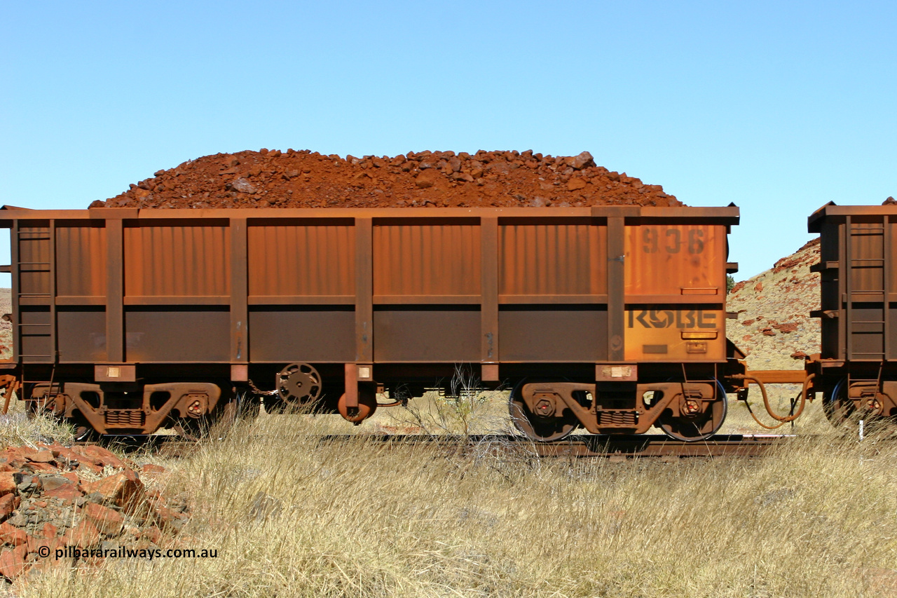 0936 060722 7489
Robe River ore waggon 936, built by Centurion Industries WA, handbrake side loaded view at the 78.8 km between Western Creek and Maitland on the Deepdale line. July 22, 2006.
Keywords: 936;Centurion-Industries-WA;Robe-ore-waggon;