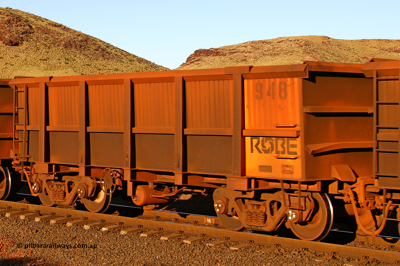 0948 060722 7619
Robe River ore waggon 948, built by Centurion Industries WA, rotary coupler end handbrake side empty view, at the 11.7 km, Cape Lambert. July 22, 2006.
Keywords: 948;Centurion-Industries-WA;Robe-ore-waggon;