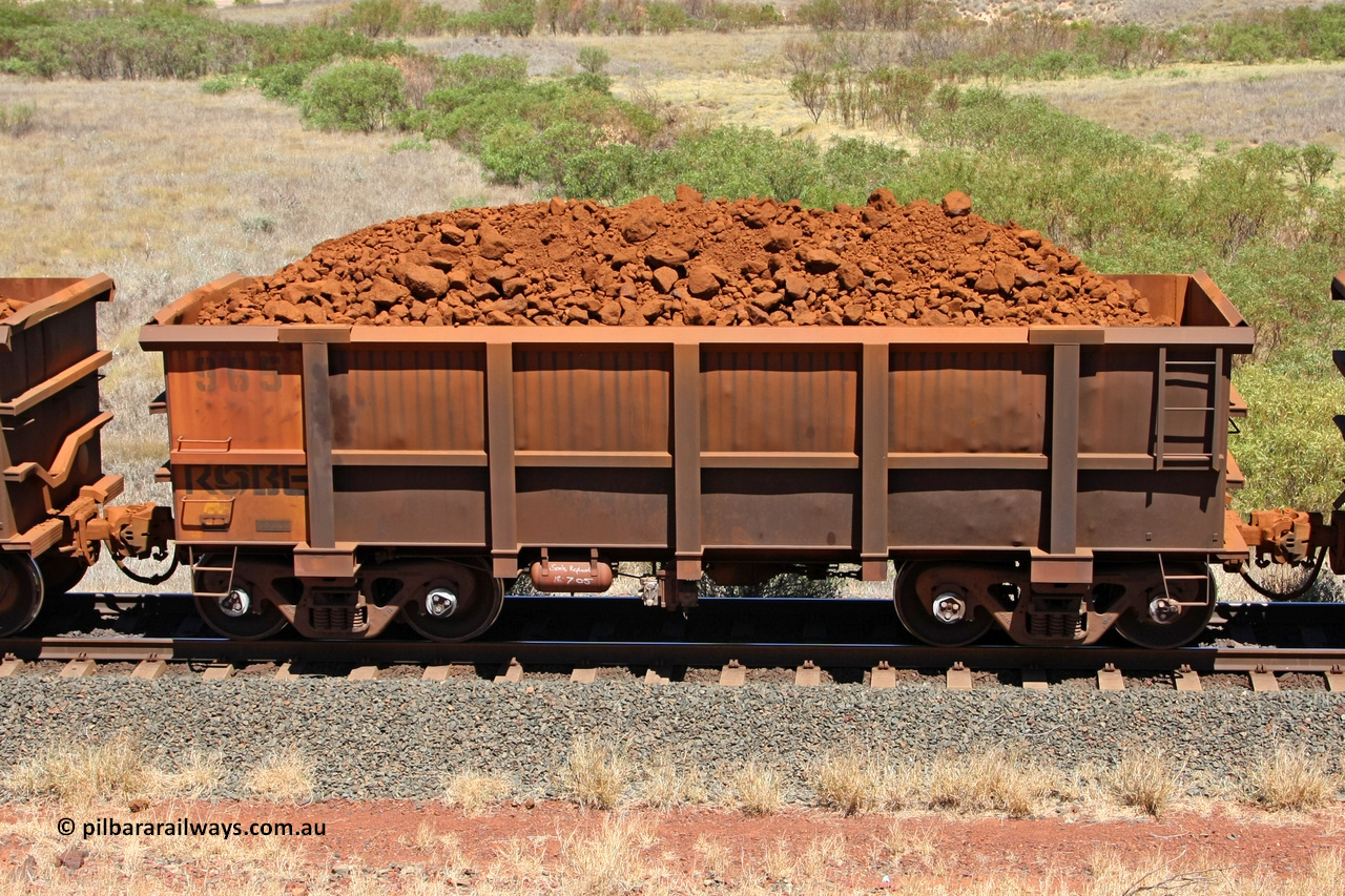 0965 081209 0139
Robe River ore waggon 965, built by Centurion Industries WA, non-handbrake side loaded view at the 7 km location just south of Cape Lambert yard. December 9, 2008.
Keywords: 965;Centurion-Industries-WA;Robe-ore-waggon;