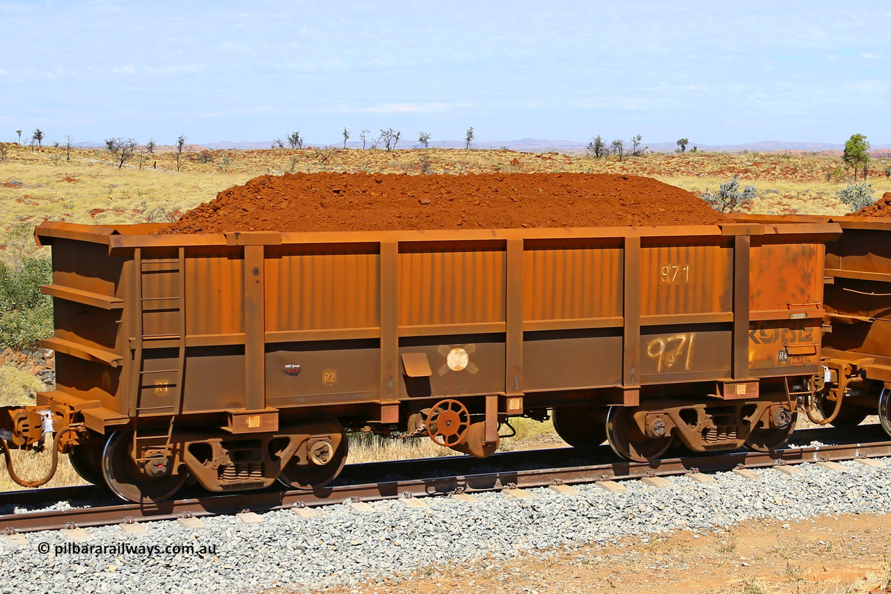 0971 170729 0248
Robe River ore waggon 971, built by Centurion Industries WA, fixed coupler handbrake side loaded view at the 103 km, between Maitland Siding and the Fortescue River on the Deepdale line. July 29, 2017.
Keywords: 971;Centurion-Industries-WA;Robe-ore-waggon;