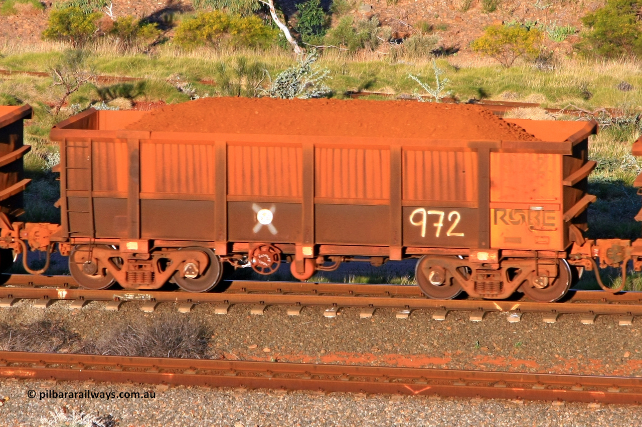 0972 110602 1659
Robe River ore waggon 972, built by Centurion Industries WA, rotary coupler end handbrake side loaded view at the 71 km, Western Creek on the Deepdale line. June 2, 2011.
Keywords: 972;Centurion-Industries-WA;Robe-ore-waggon;