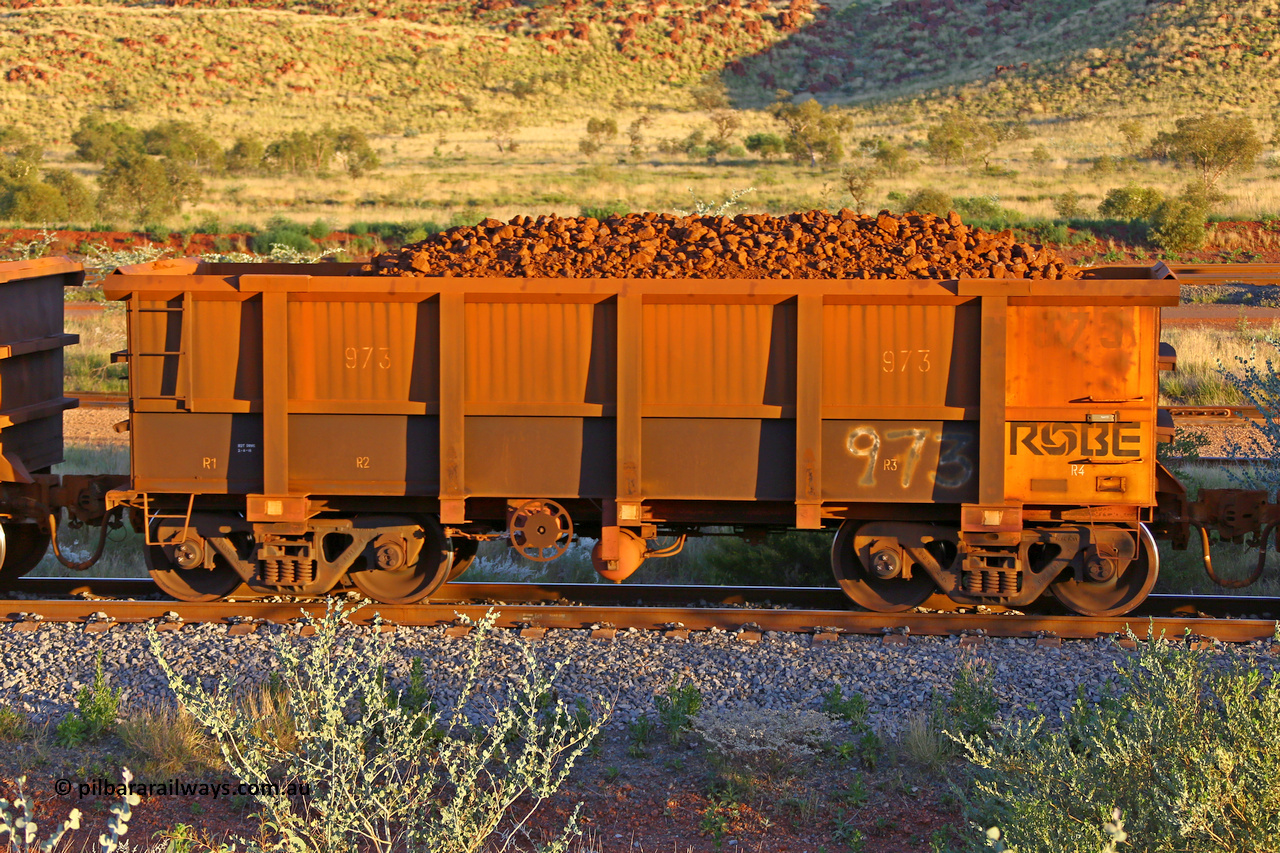 0973 170513 8714
Robe River ore waggon 972, built by Centurion Industries WA, rotary coupler end handbrake side loaded view, Cape Lambert yard, May 13, 2017.
Keywords: 973;Centurion-Industries-WA;Robe-ore-waggon;