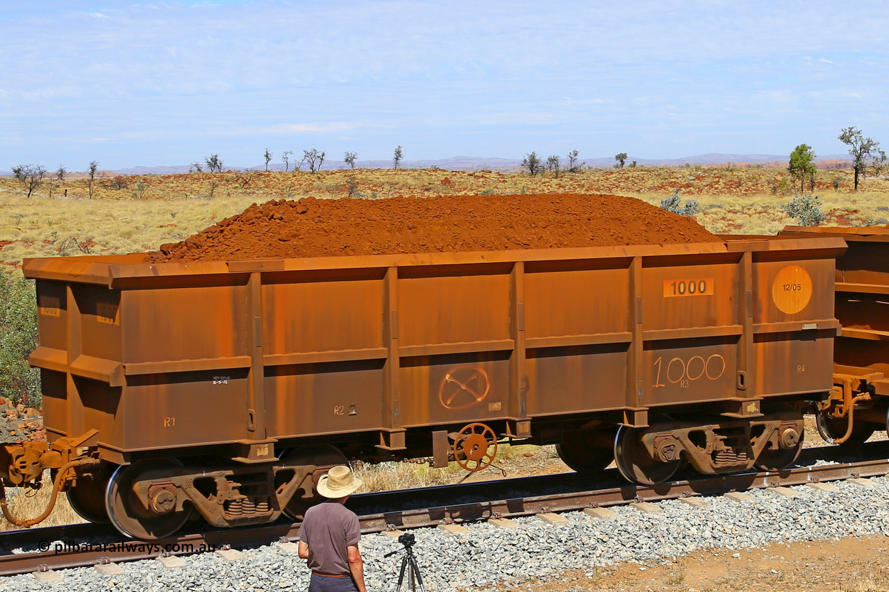 1000 170729 0271
Robe River ore waggon 1000, class leader built by Bradken Rail Qld in December 2005, fixed coupler handbrake side loaded view at the 103 km, between Maitland Siding and the Fortescue River on the Deepdale line. July 29, 2017.
Keywords: 1000;Bradken-Rail-Qld;Robe-ore-waggon;