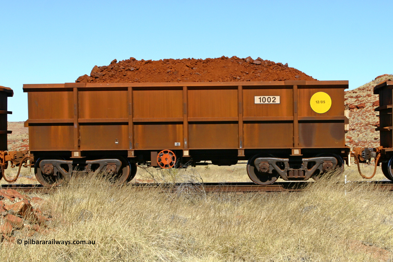 1002 060722 7487
Robe River ore waggon 1002, built by Bradken Rail Qld in December 2005, handbrake side loaded view at the 78.8 km between Western Creek and Maitland on the Deepdale line. July 22, 2006.
Keywords: 1002;Bradken-Rail-Qld;Robe-ore-waggon;