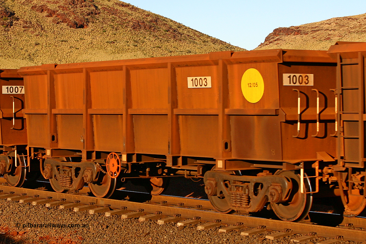 1003 060722 7598
Robe River ore waggon 1003, built by Bradken Rail Qld in December 2005, rotary coupler end handbrake side empty view, at the 11.7 km, Cape Lambert. July 22, 2006.
Keywords: 1003;Bradken-Rail-Qld;Robe-ore-waggon;
