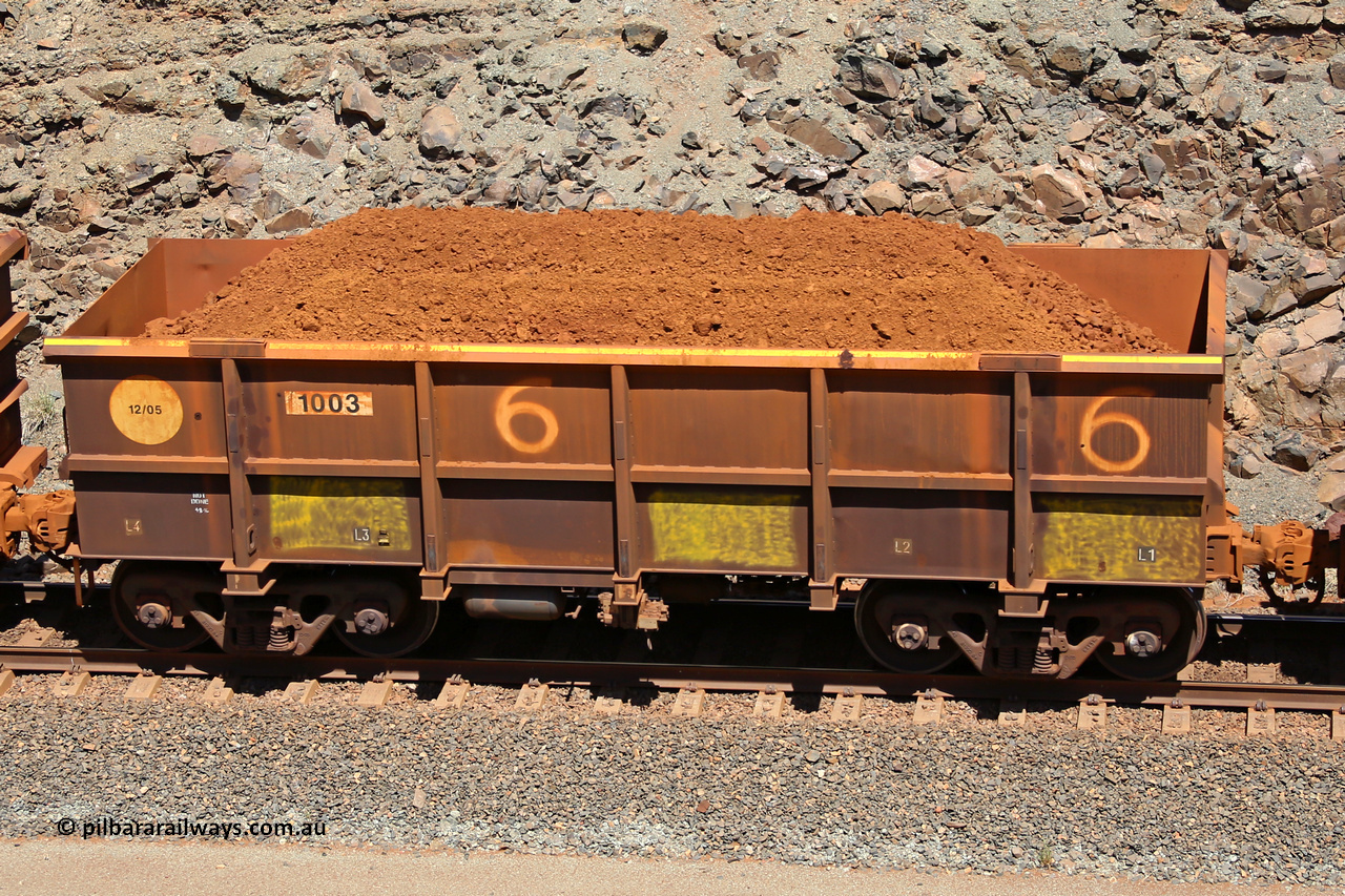 1003 160306 1558
Robe River ore waggon 1003, built by Bradken Rail Qld in December 2005, fixed coupler non-handbrake side loaded view, at the 45 km, Harding Siding on the Cape Lambert line. March 6, 2016.
Keywords: 1003;Bradken-Rail-Qld;Robe-ore-waggon;