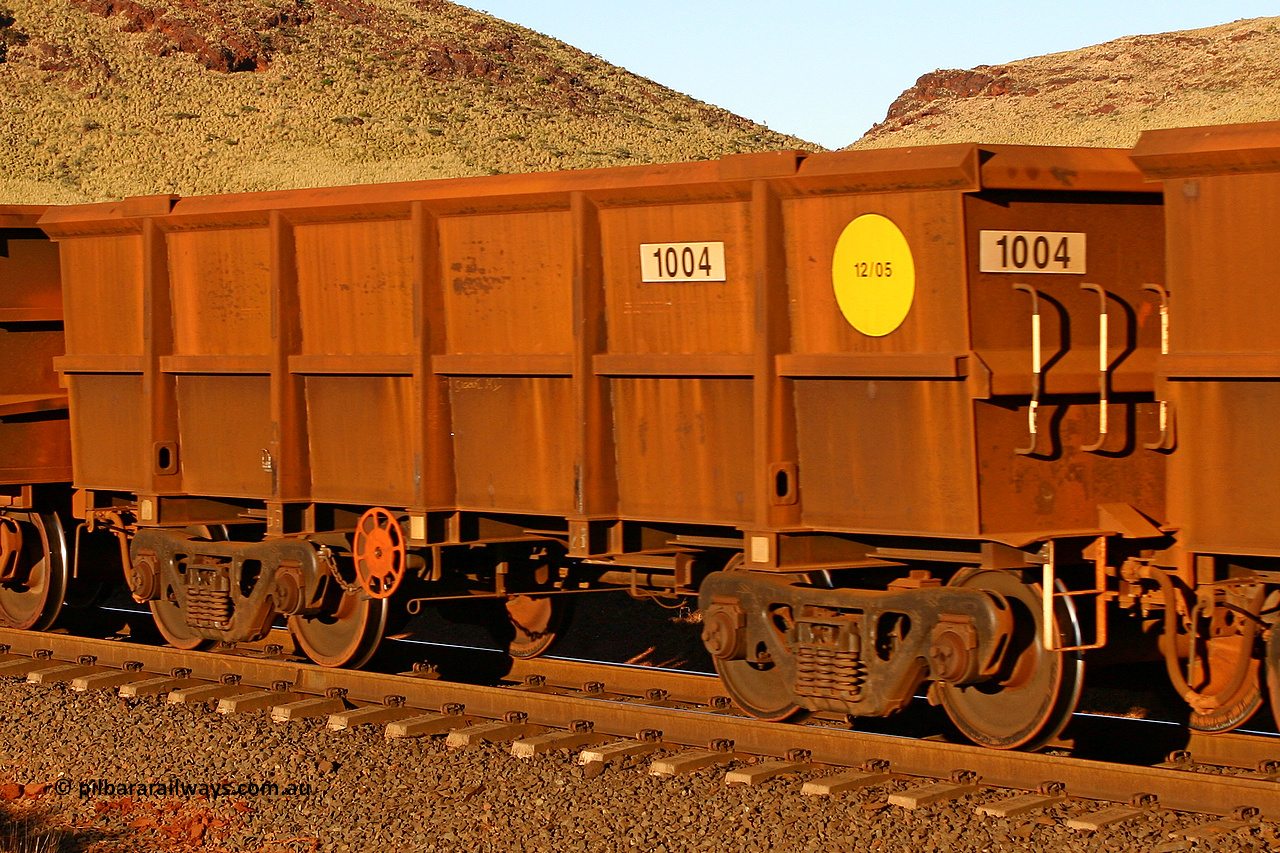 1004 060722 7603
Robe River ore waggon 1004, built by Bradken Rail Qld in December 2005, rotary coupler end handbrake side empty view, at the 11.7 km, Cape Lambert. July 22, 2006.
Keywords: 1004;Bradken-Rail-Qld;Robe-ore-waggon;