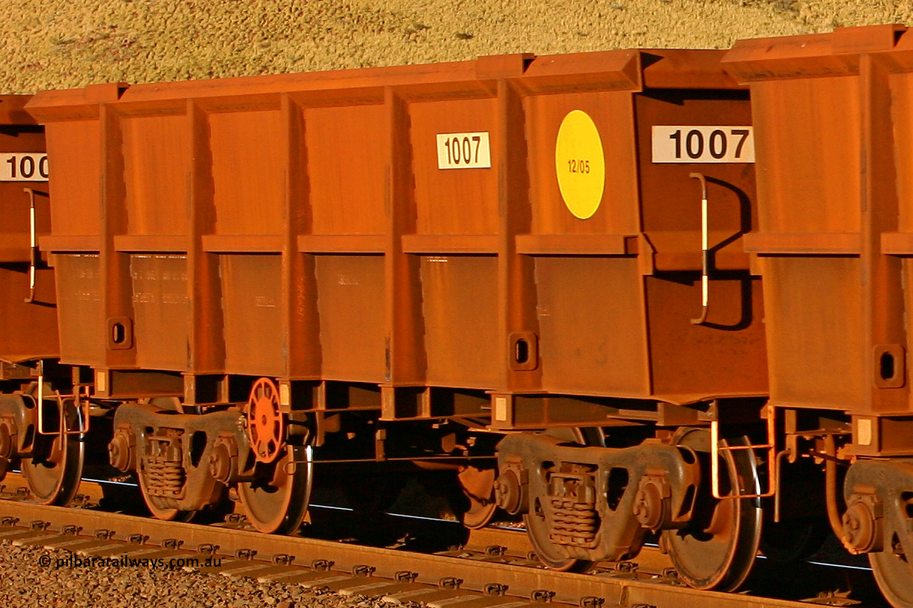 1007 060722 7598
Robe River ore waggon 1007, built by Bradken Rail Qld in December 2005, rotary coupler end handbrake side empty view, at the 11.7 km, Cape Lambert. July 22, 2006.
Keywords: 1007;Bradken-Rail-Qld;Robe-ore-waggon;