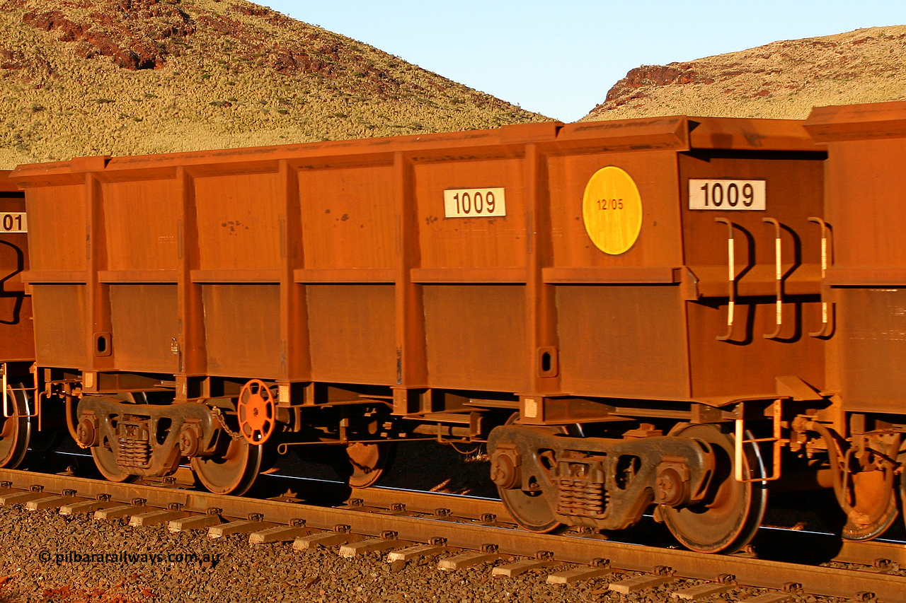 1009 060722 7600
Robe River ore waggon 1009, built by Bradken Rail Qld in December 2005, rotary coupler end handbrake side empty view, at the 11.7 km, Cape Lambert. July 22, 2006.
Keywords: 1009;Bradken-Rail-Qld;Robe-ore-waggon;