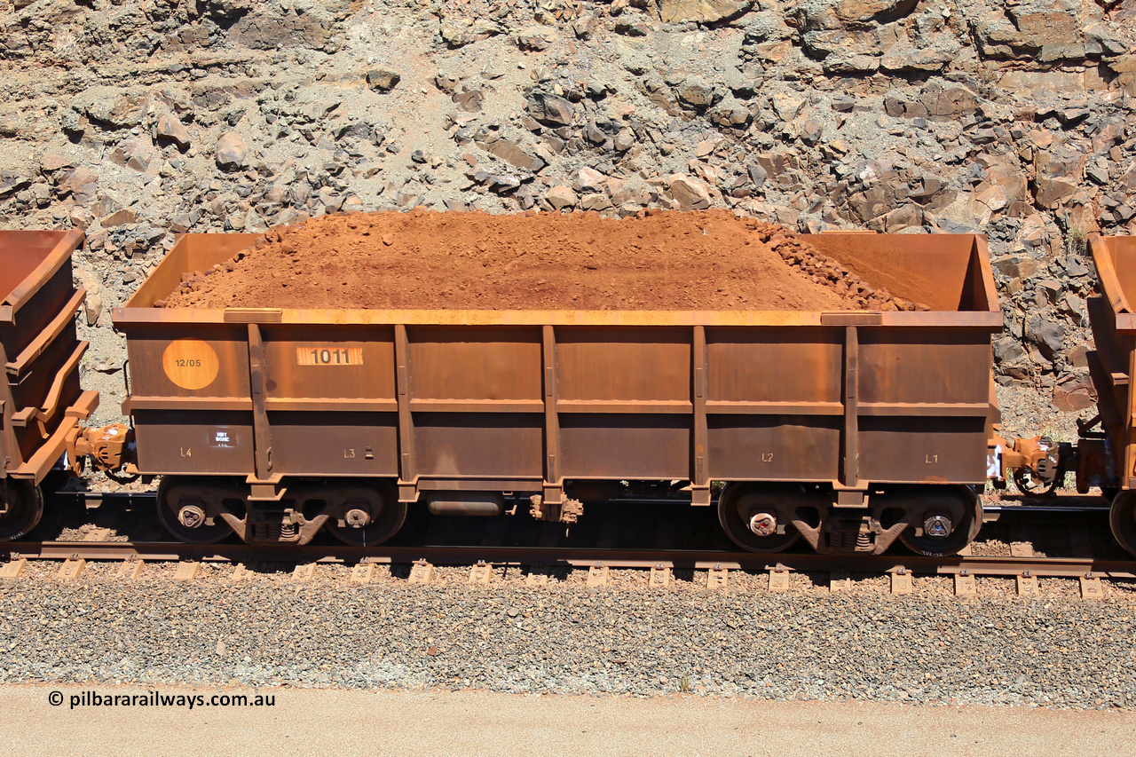 1011 160306 1509
Robe River ore waggon 1011, built by Bradken Rail Qld in December 2005, non-handbrake side loaded view, at the 45 km, Harding Siding on the Cape Lambert line. March 6, 2016.
Keywords: 1011;Bradken-Rail-Qld;Robe-ore-waggon;