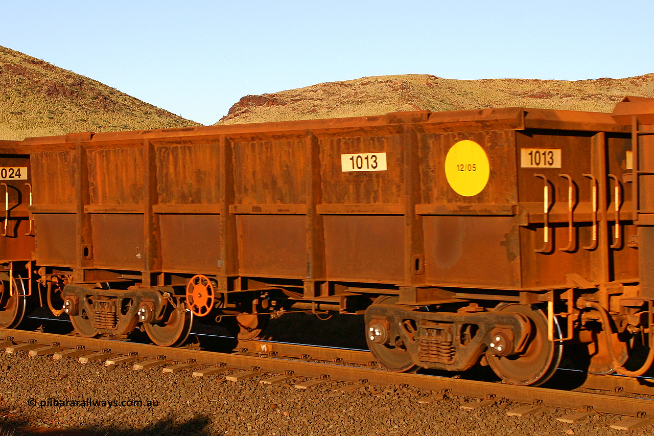 1013 060722 7627
Robe River ore waggon 1013, built by Bradken Rail Qld in December 2005, rotary coupler end handbrake side empty view, at the 11.7 km, Cape Lambert. July 22, 2006.
Keywords: 1013;Bradken-Rail-Qld;Robe-ore-waggon;