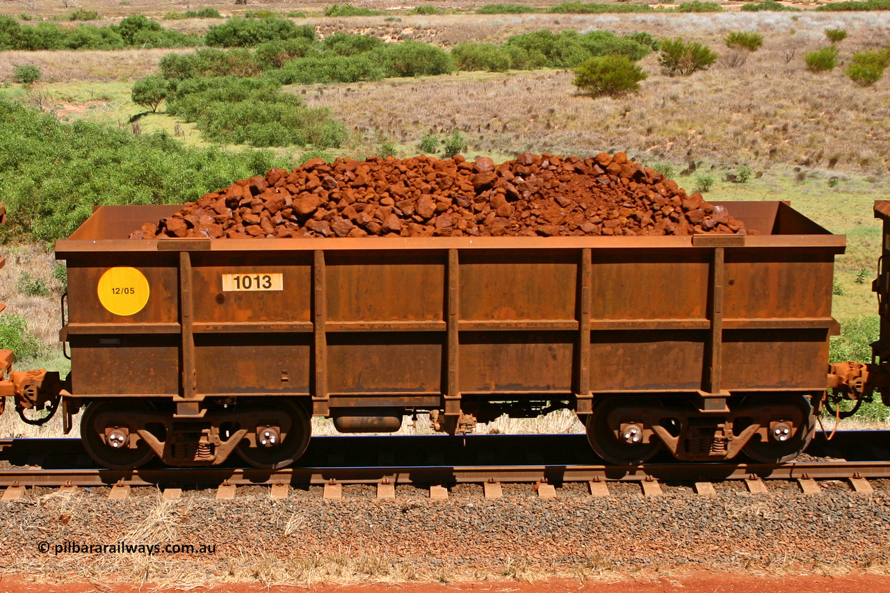 1013 061209 8192
Robe River ore waggon 1013, built by Bradken Rail Qld in December 2005, non-handbrake side loaded view at the 7 km location just south of Cape Lambert yard. December 9, 2006.
Keywords: 1013;Bradken-Rail-Qld;Robe-ore-waggon;