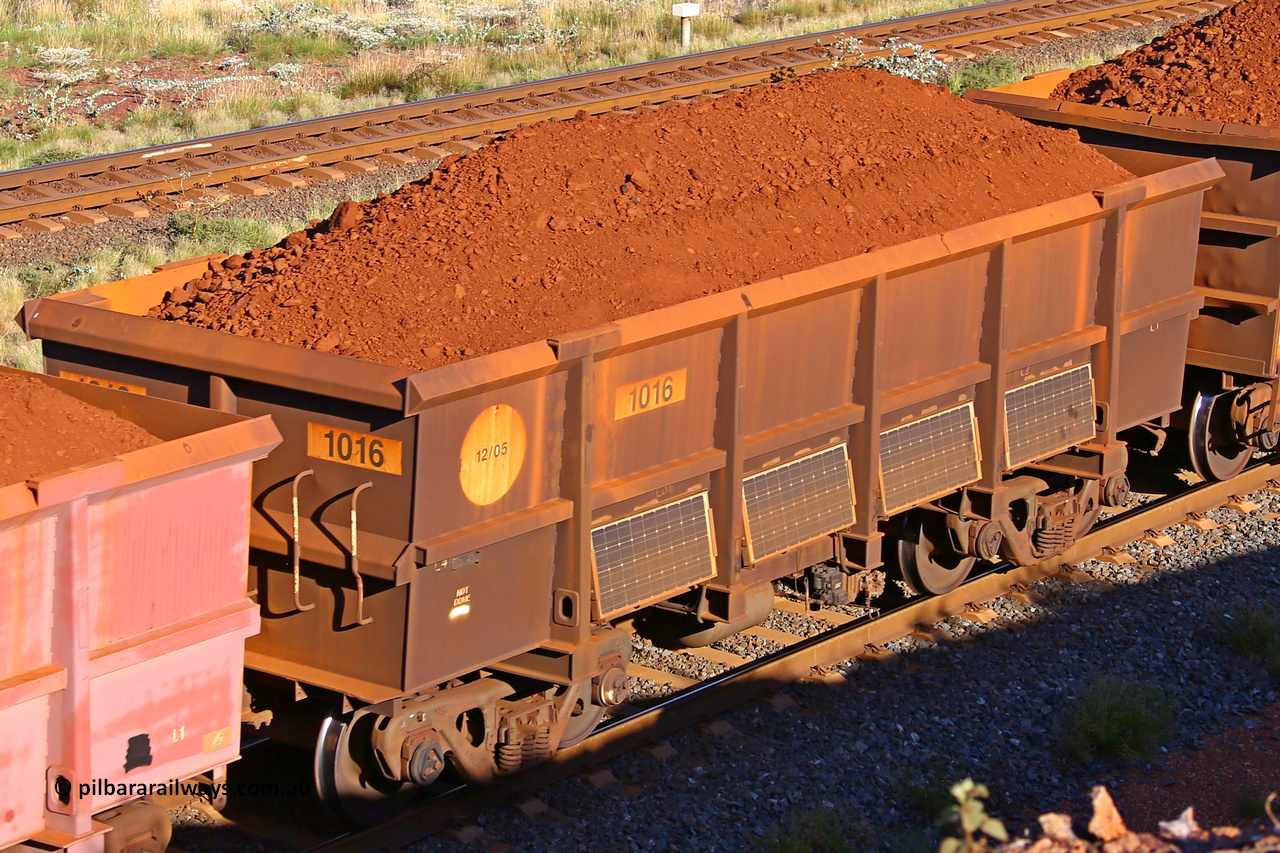 1016 210322 9711
Robe River ore waggon 1016, built by Bradken Rail Qld in December 2005, rotary coupler end non-handbrake side loaded view, at the 17 km on the Cape Lambert line, March 22, 2021.
Keywords: 1016;Bradken-Rail-Qld;Robe-ore-waggon;