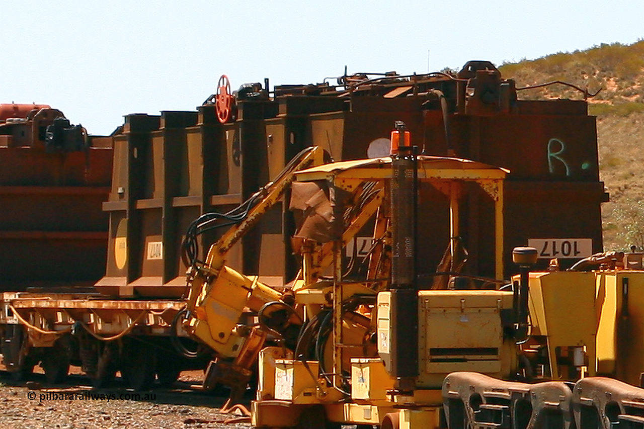 1017 070909 0667
Robe River ore waggon 1017, built by Bradken Rail Qld in December 2005, fixed coupler handbrake side upside down on flat waggon, Cape Lambert. September 9, 2007.
Keywords: 1017;Bradken-Rail-Qld;Robe-ore-waggon;