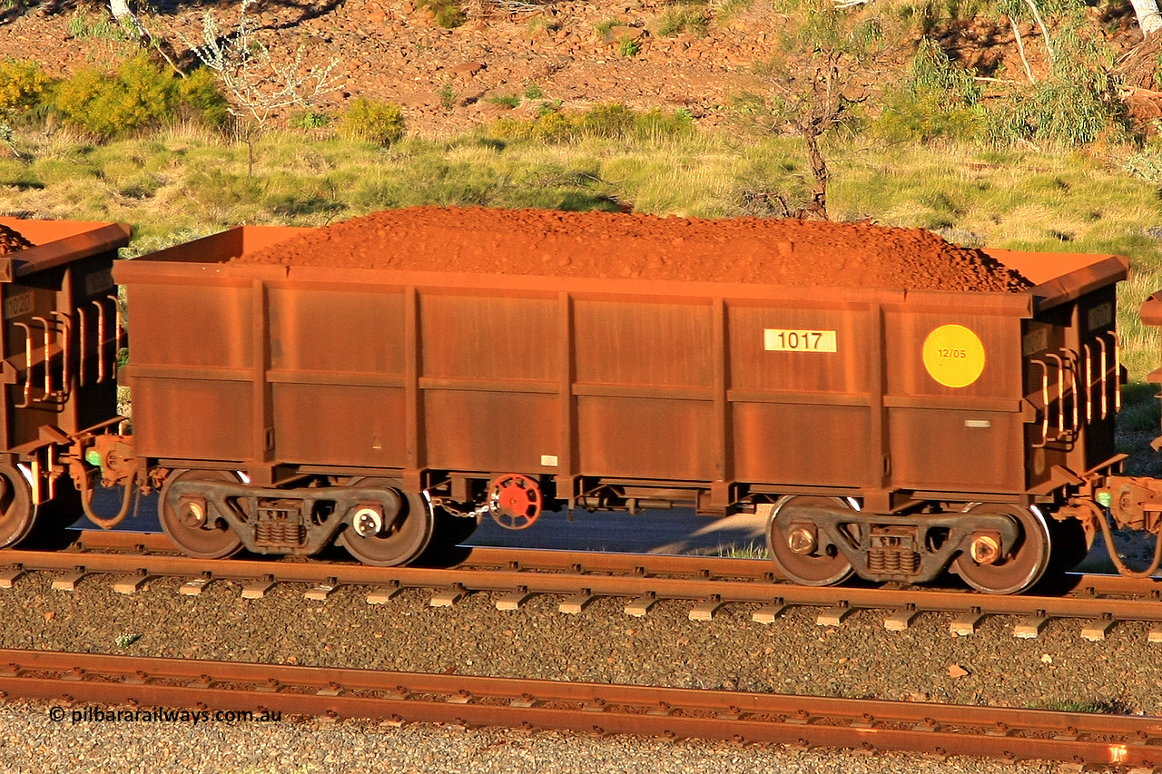 1017 110602 1647
Robe River ore waggon 1017, built by Bradken Rail Qld in December 2005, rotary coupler end handbrake side loaded view at the 71 km, Western Creek on the Deepdale line. June 2, 2011.
Keywords: 1017;Bradken-Rail-Qld;Robe-ore-waggon;