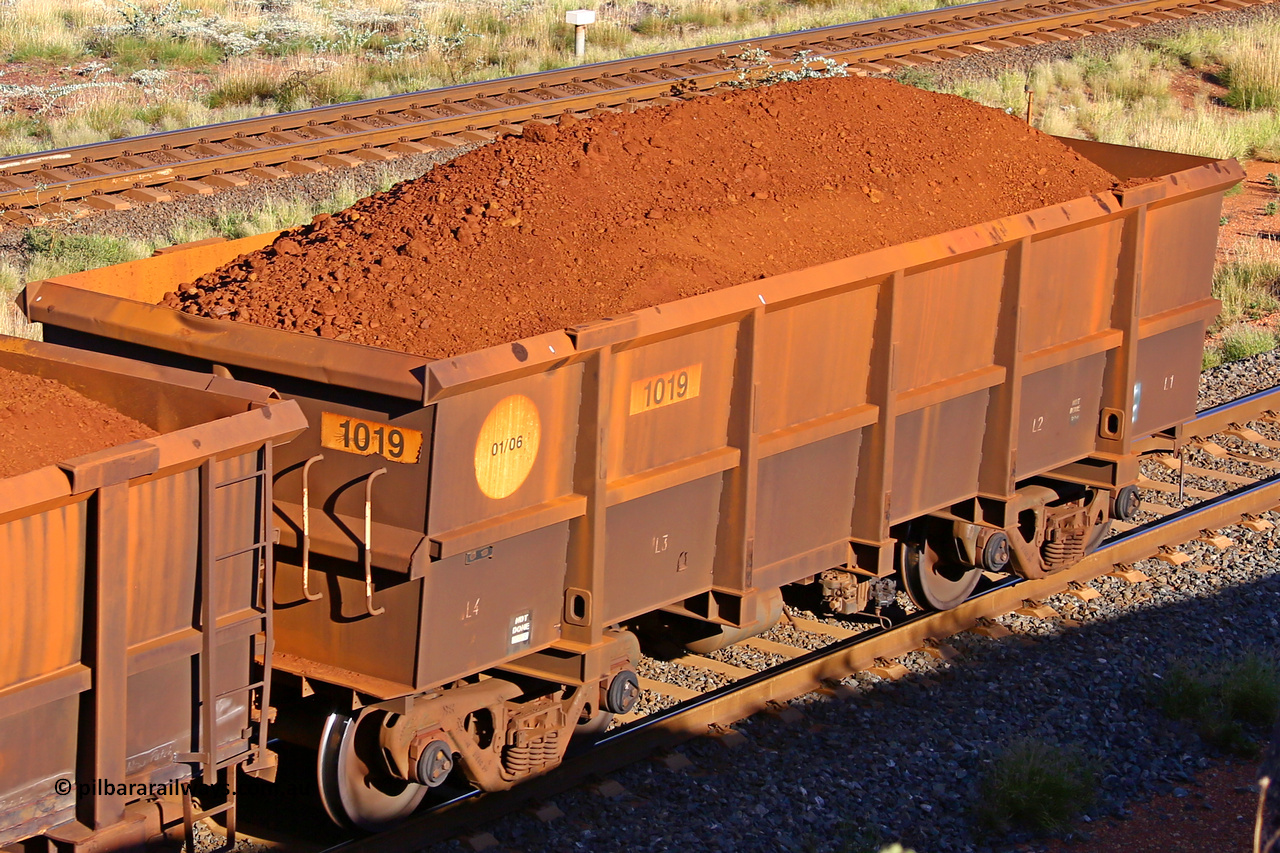 1019 210322 9796
Robe River ore waggon 1019, built by Bradken Rail Qld in January 2006, rotary coupler end non-handbrake side loaded view, at the 17 km on the Cape Lambert line, March 22, 2021.
Keywords: 1019;Bradken-Rail-Qld;Robe-ore-waggon;