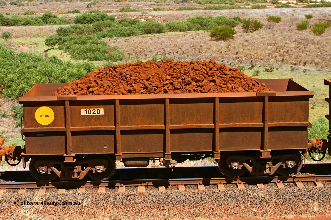1020 061209 8186
Robe River ore waggon 1020, built by Bradken Rail Qld in January 2006, non-handbrake side loaded view at the 7 km location just south of Cape Lambert yard. December 9, 2006.
Keywords: 1020;Bradken-Rail-Qld;Robe-ore-waggon;