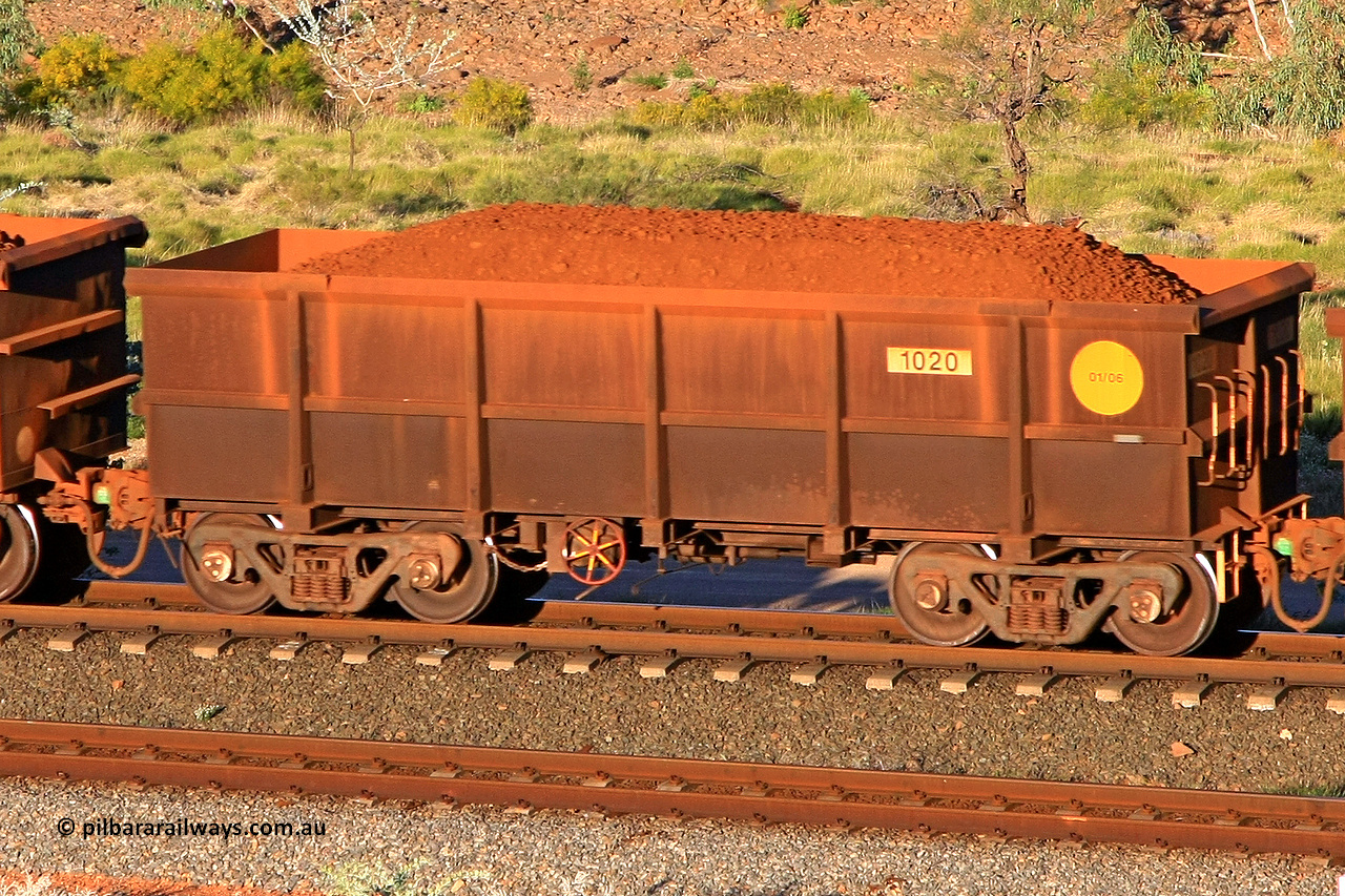 1020 110602 1646
Robe River ore waggon 1020, built by Bradken Rail Qld in January 2006, rotary coupler end handbrake side loaded view at the 71 km, Western Creek on the Deepdale line. June 2, 2011.
Keywords: 1020;Bradken-Rail-Qld;Robe-ore-waggon;