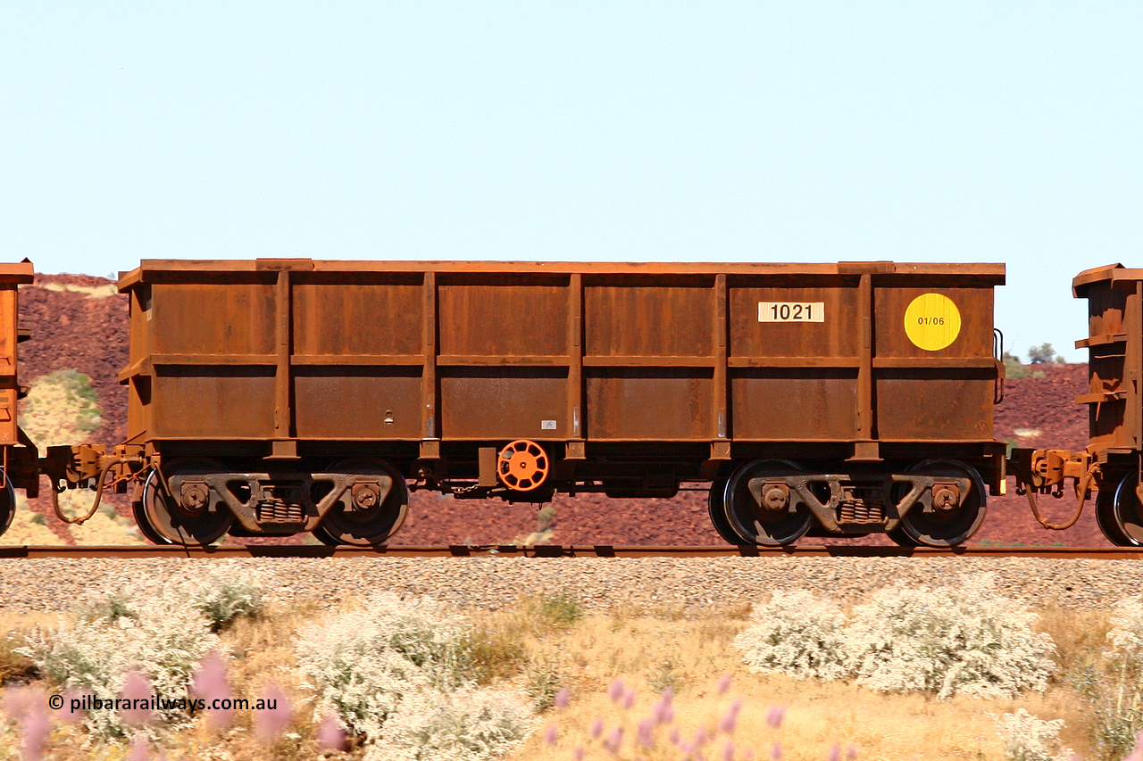1021 060722 7435
Robe River ore waggon 1021, built by Bradken Rail Qld in January 2006, fixed coupler handbrake side empty view at the 45.4 km just south of Harding Siding on the Cape Lambert line. July 22, 2006.
Keywords: 1021;Bradken-Rail-Qld;Robe-ore-waggon;