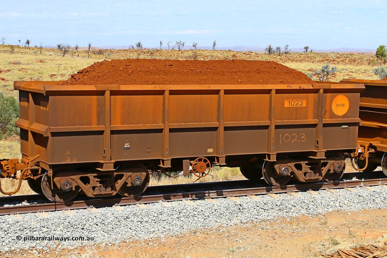 1023 170729 0236
Robe River ore waggon 1023, built by Bradken Rail Qld in January 2006, fixed coupler handbrake side loaded view at the 103 km, between Maitland Siding and the Fortescue River on the Deepdale line. July 29, 2017.
Keywords: 1023;Bradken-Rail-Qld;Robe-ore-waggon;