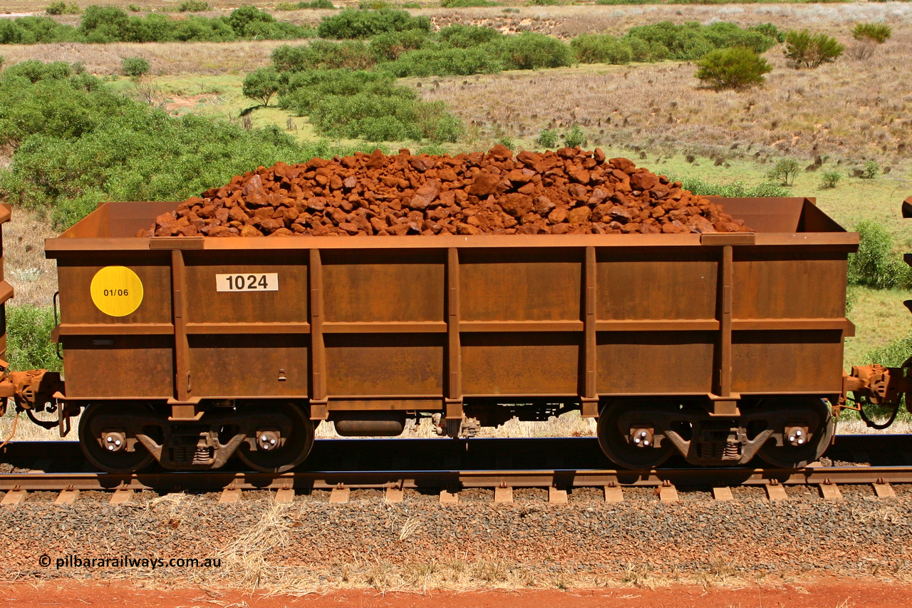 1024 061209 8191
Robe River ore waggon 1024, built by Bradken Rail Qld in January 2006, non-handbrake side loaded view at the 7 km location just south of Cape Lambert yard. December 9, 2006.
Keywords: 1024;Bradken-Rail-Qld;Robe-ore-waggon;