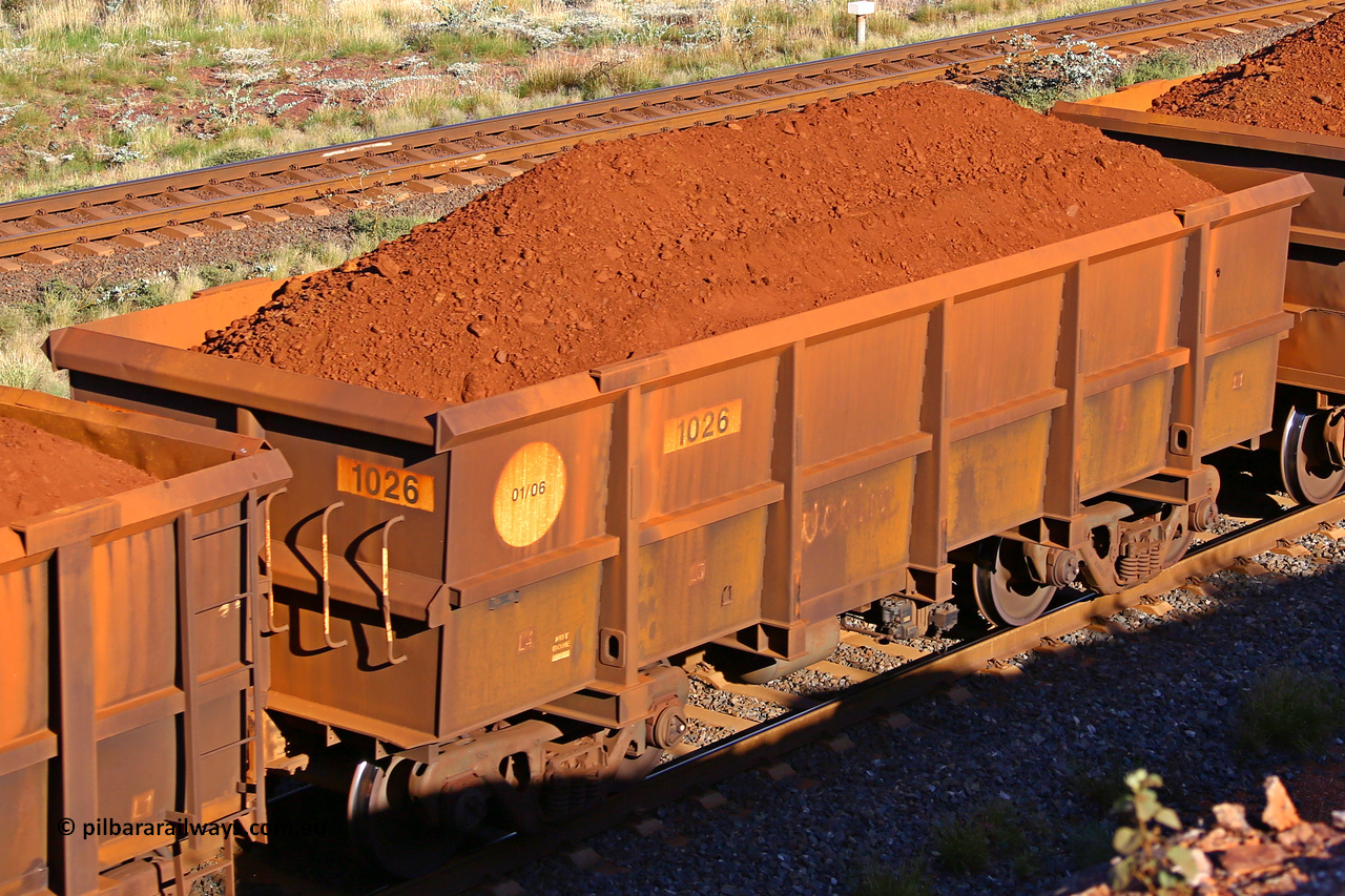 1026 210322 9715
Robe River ore waggon 1026, built by Bradken Rail Qld in January 2006, rotary coupler end non-handbrake side loaded view, at the 17 km on the Cape Lambert line, March 22, 2021.
Keywords: 1026;Bradken-Rail-Qld;Robe-ore-waggon;