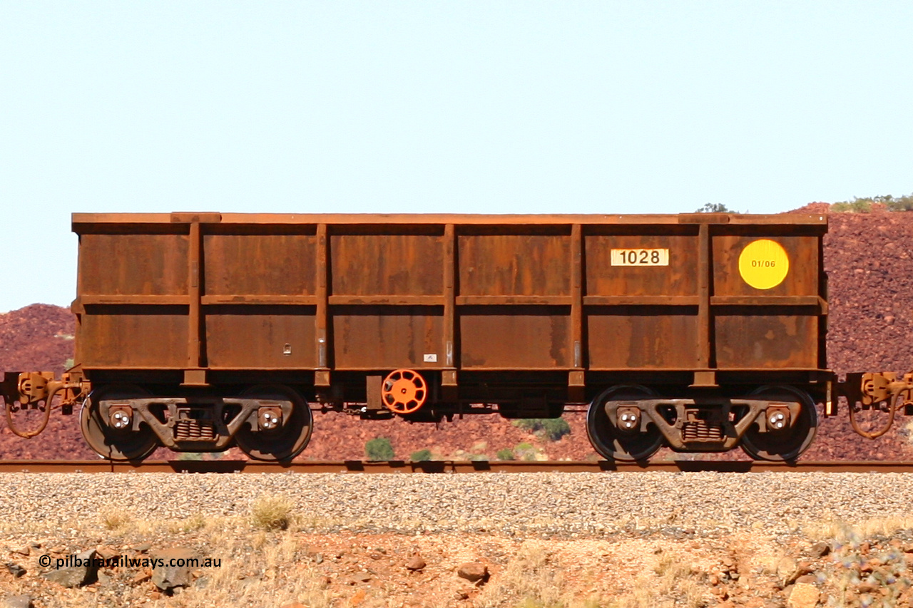 1028 060722 7437
Robe River ore waggon 1028, built by Bradken Rail Qld in January 2006, handbrake side empty view at the 45.4 km just south of Harding Siding on the Cape Lambert line. July 22, 2006.
Keywords: 1028;Bradken-Rail-Qld;Robe-ore-waggon;