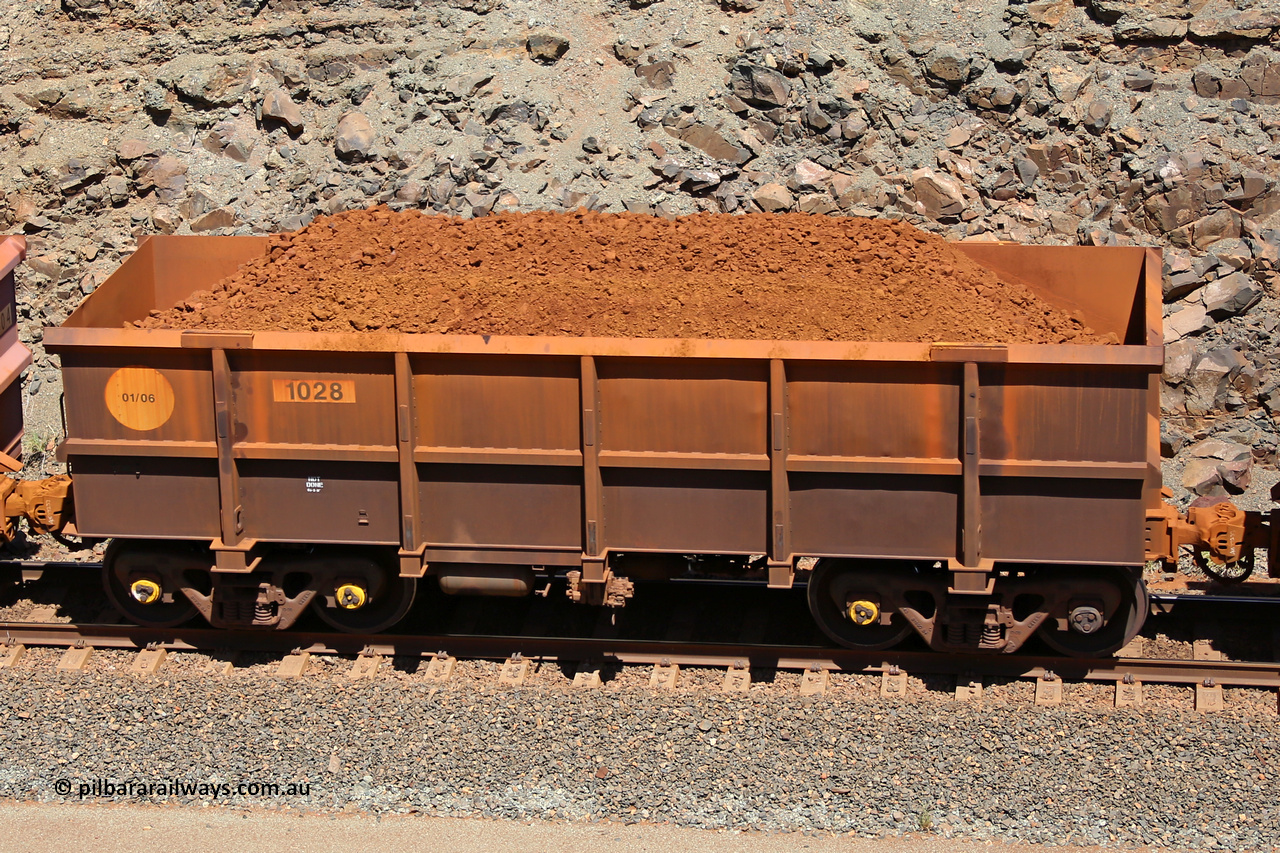 1028 160306 1561
Robe River ore waggon 1028, built by Bradken Rail Qld in January 2006, fixed coupler non-handbrake side loaded view, at the 45 km, Harding Siding on the Cape Lambert line. March 6, 2016.
Keywords: 1028;Bradken-Rail-Qld;Robe-ore-waggon;