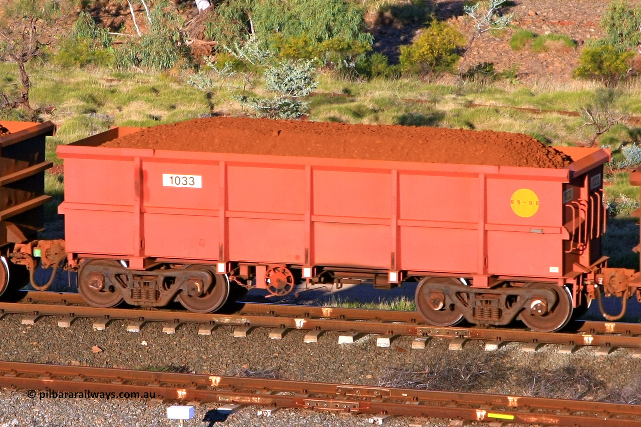 1033 110602 1624
Robe River ore waggon 1033, built by Bradken Rail Qld in September 2008, rotary coupler end handbrake side loaded view at the 71 km, Western Creek on the Deepdale line. June 2, 2011.
Keywords: 1033;Bradken-Rail-Qld;Robe-ore-waggon;