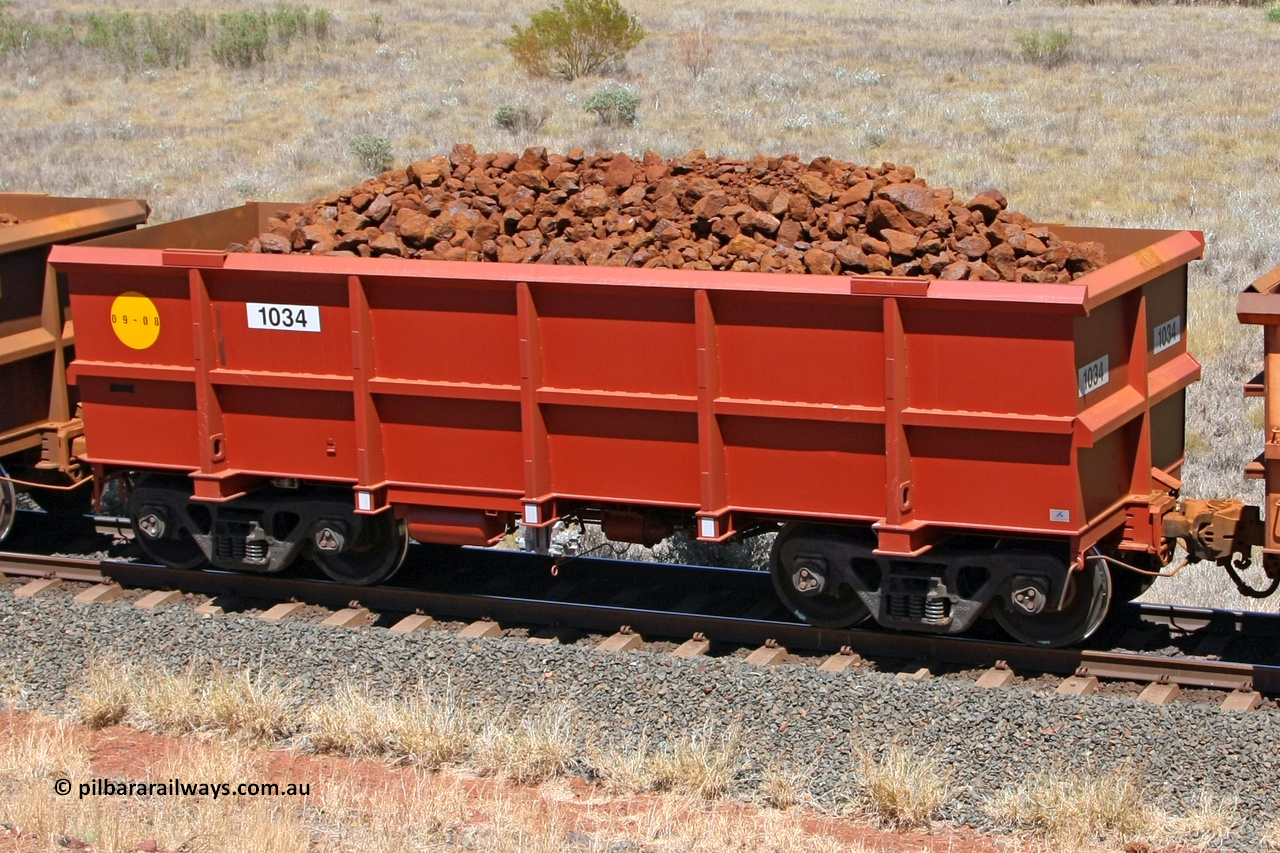 1034 081209 0160
Robe River ore waggon 1034, built by Bradken Rail Qld in September 2008, fixed coupler non-handbrake side loaded view at the 7 km location just south of Cape Lambert yard. December 9, 2008.
Keywords: 1034;Bradken-Rail-Qld;Robe-ore-waggon;