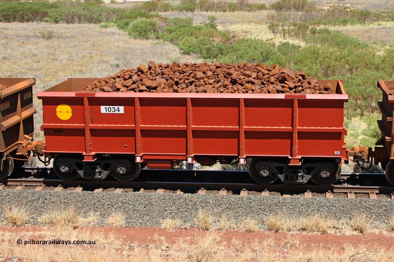 1034 081209 0161
Robe River ore waggon 1034, built by Bradken Rail Qld in September 2008, non-handbrake side loaded view at the 7 km location just south of Cape Lambert yard. December 9, 2008.
Keywords: 1034;Bradken-Rail-Qld;Robe-ore-waggon;