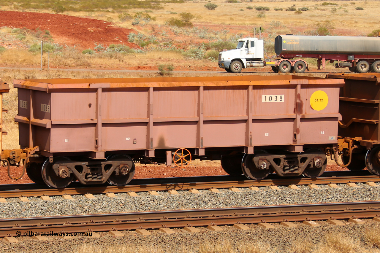1038 141124 6818
Robe River ore waggon 1038, built by Bradken Rail Qld in April 2012, fixed coupler handbrake side empty view at the 25 km at Arches Siding on the Cape Lambert line. November 24, 2014.
Keywords: 1038;Bradken-Rail-Qld;Robe-ore-waggon;