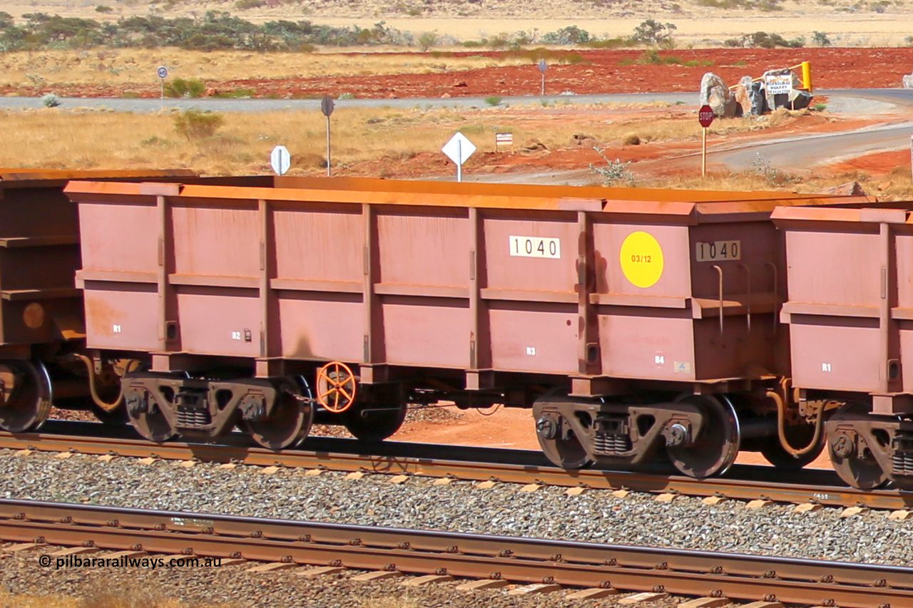 1040 141124 6811
Robe River ore waggon 1040, built by Bradken Rail Qld in March 2012, rotary coupler end handbrake side empty view at the 25 km at Arches Siding on the Cape Lambert line. November 24, 2014.
Keywords: 1040;Bradken-Rail-Qld;Robe-ore-waggon;