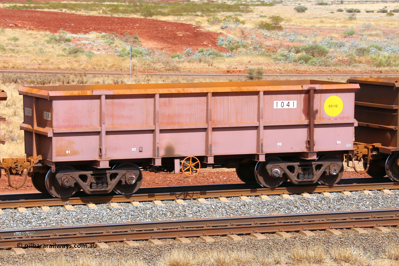 1041 141124 6843
Robe River ore waggon 1041, built by Bradken Rail Qld in March 2012, fixed coupler handbrake side empty view at the 25 km at Arches Siding on the Cape Lambert line. November 24, 2014.
Keywords: 1041;Bradken-Rail-Qld;Robe-ore-waggon;