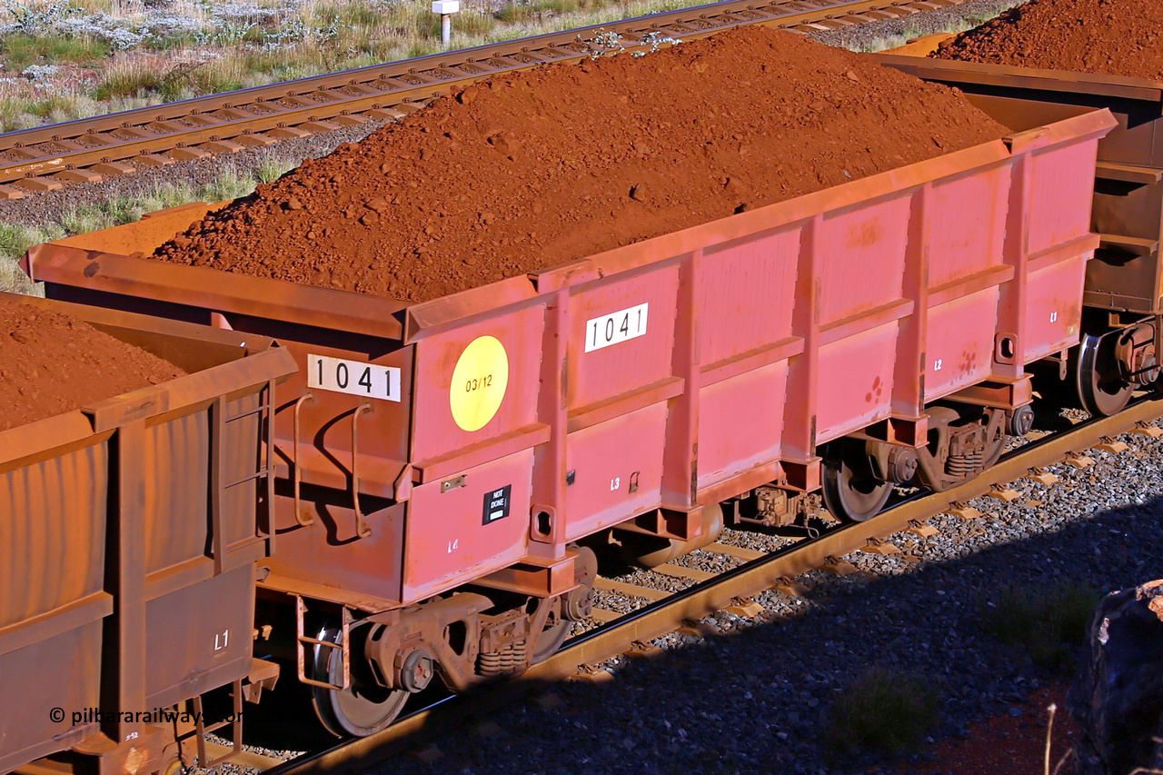 1041 210322 9700
Robe River ore waggon 1041, built by Bradken Rail Qld in March 2012, rotary coupler end non-handbrake side loaded view, at the 17 km on the Cape Lambert line, March 22, 2021.
Keywords: 1041;Bradken-Rail-Qld;Robe-ore-waggon;