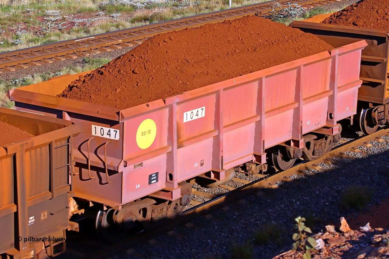 1047 210322 9682
Robe River ore waggon 1047, built by Bradken Rail Qld in March 2012, rotary coupler end non-handbrake side loaded view, at the 17 km on the Cape Lambert line, March 22, 2021.
Keywords: 1047;Bradken-Rail-Qld;Robe-ore-waggon;