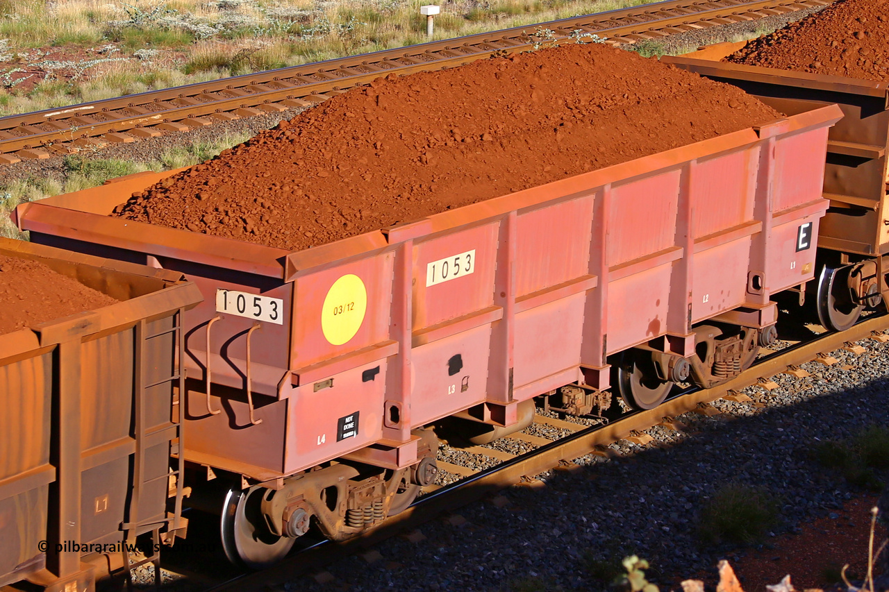 1053 210322 9719
Robe River ore waggon 1053, built by Bradken Rail Qld in March 2012, rotary coupler end non-handbrake side loaded view, at the 17 km on the Cape Lambert line, March 22, 2021.
Keywords: 1053;Bradken-Rail-Qld;Robe-ore-waggon;