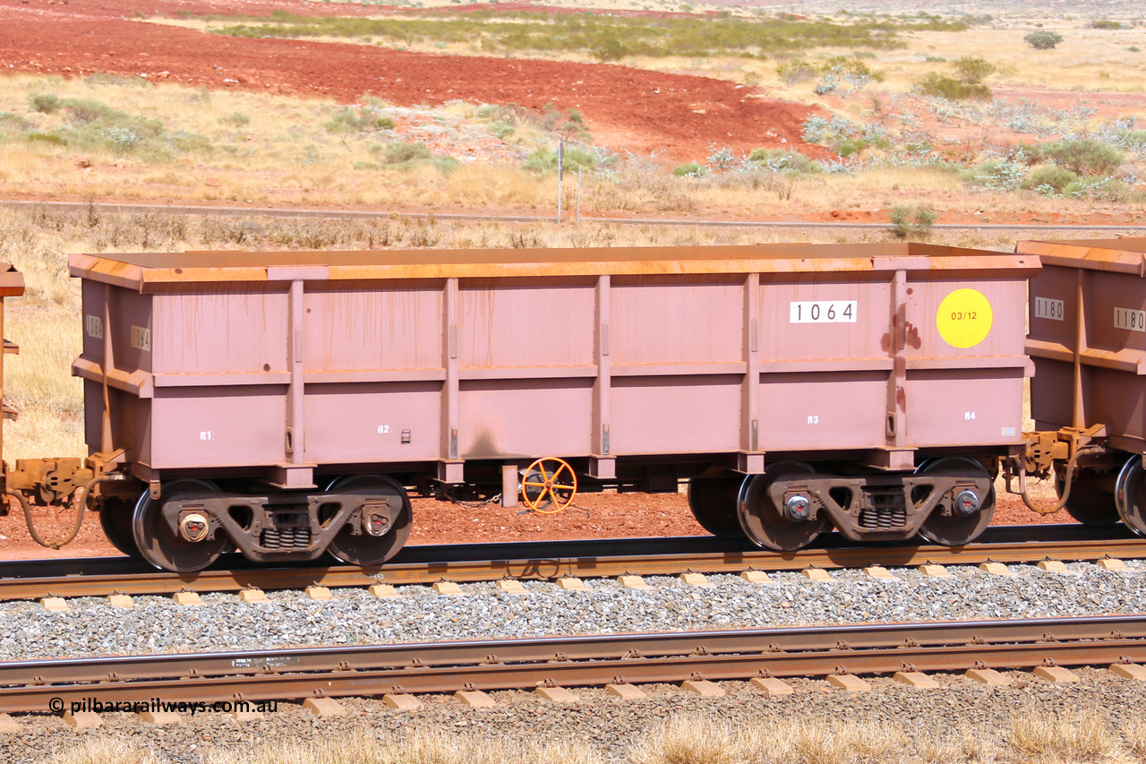 1064 141124 6869
Robe River ore waggon 1064, built by Bradken Rail Qld in March 2012, fixed coupler handbrake side empty view at the 25 km at Arches Siding on the Cape Lambert line. November 24, 2014.
Keywords: 1064;Bradken-Rail-Qld;Robe-ore-waggon;