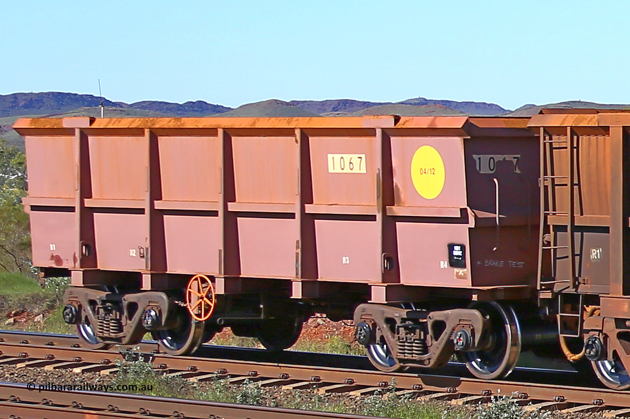 1067 160727 0990
Robe River ore waggon 1067, built by Bradken Rail Qld in April 2012, rotary coupler end handbrake side empty view at Harding Siding on the Cape Lambert line, July 27, 2016.
Keywords: 1067;Bradken-Rail-Qld;Robe-ore-waggon;